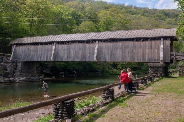 Fishing at Beaverkill Covered Bridge in Sullivan County, New York