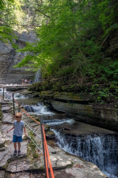 Hiking on the trail to Eagle Cliff Falls in Hanava Glen