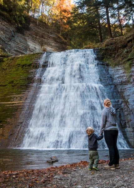 Family hiking the Gorge Trail in Stony Brook State Park in Upstate NY