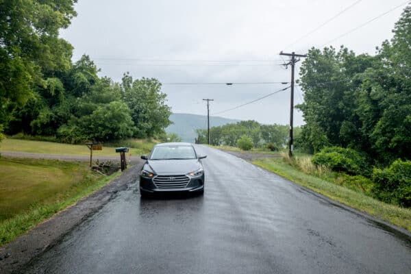 Car sitting on the Gravity Hill in Yates County New York