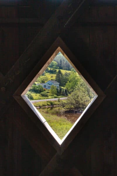 Looking through a window in Fitches Covered Bridge in the Catskills