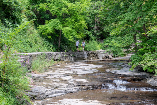 People walking on the trail in Cascadilla Gorge in Ithaca NY