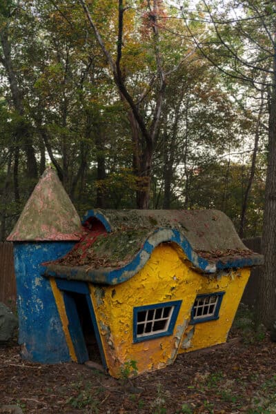 Yellow and blue playground house at the Abandoned Catskill Game Farm in New York