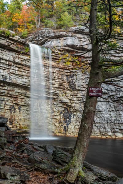 No swimming sign in front of Awosting Falls in Minnewaska State Park Preserve in Ulster County NY