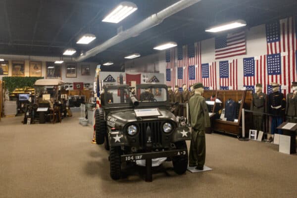 Military car and other items at Homeville in Cortland New York
