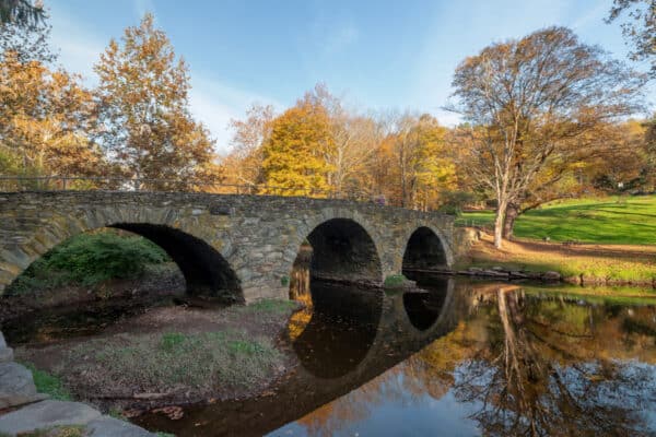 Fall scene at Stone Arch Bridge Historical Park in Sullivan County New York