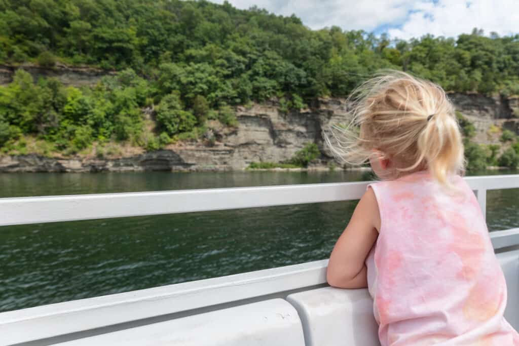 Girl looking out from Captain Bill's Scenic Tours on Seneca Lake in New York