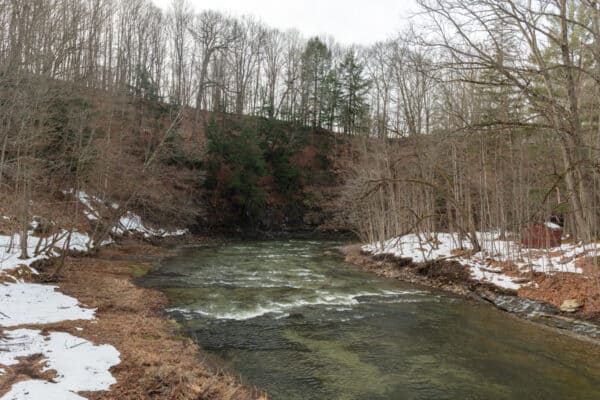 Snow covered banks surrounding Cayuga Creek in Wyoming County New York