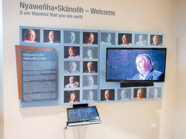 Video display with photos at the Display at the Skä•noñh Great Law of Peace Center in Syracuse NY
