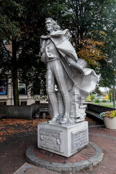A silver statue of Uncle Sam Wilson on bricks in Troy New York