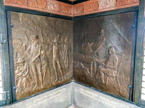 Brass reliefs of the Battle of Saratoga on the Saratoga Monument in Victory New York