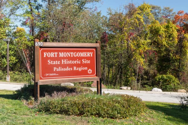 Red sign at the entrance to Fort Montgomery State Historic Site in Montgomery NY