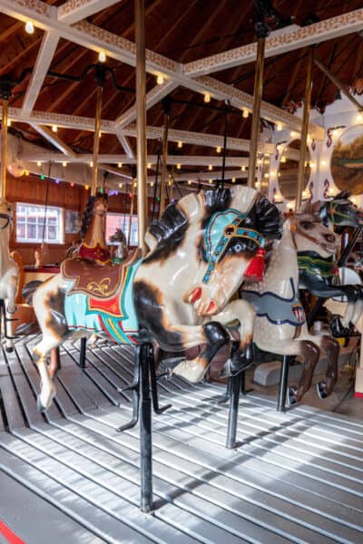 Historic wooden horses on the carousel at the Herschell Carrousel Factory Museum in New York