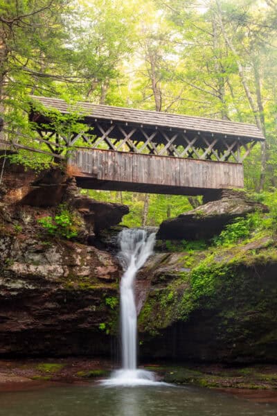 Artist Falls flowing below Alfred Clark Covered Bridge in Greene County New York