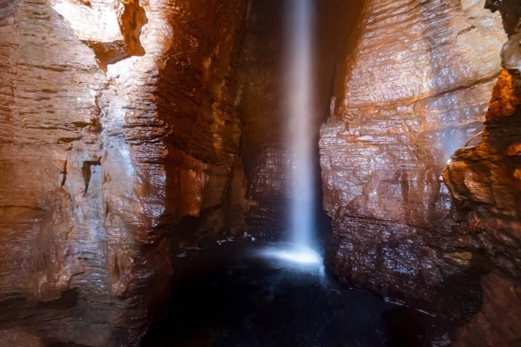 The 100 foot underground waterfall in Secret Caverns in Schoharie County, NY