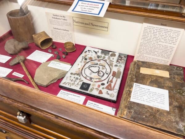 Native American items on display in a case at the Old Stone Fort in Schoharie County New York